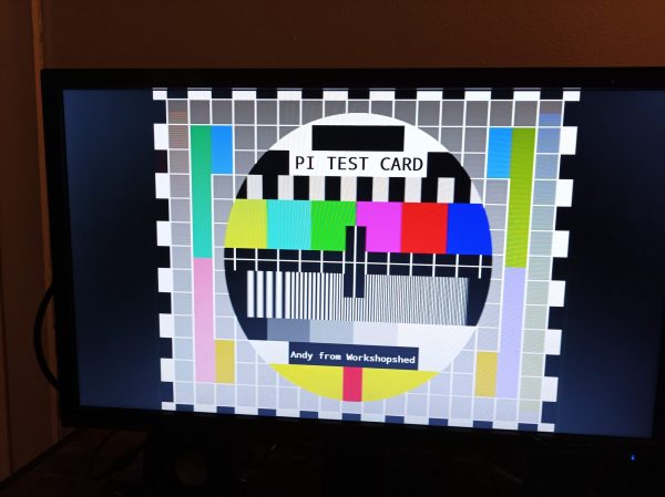 A square test card on a rectangular monitor.