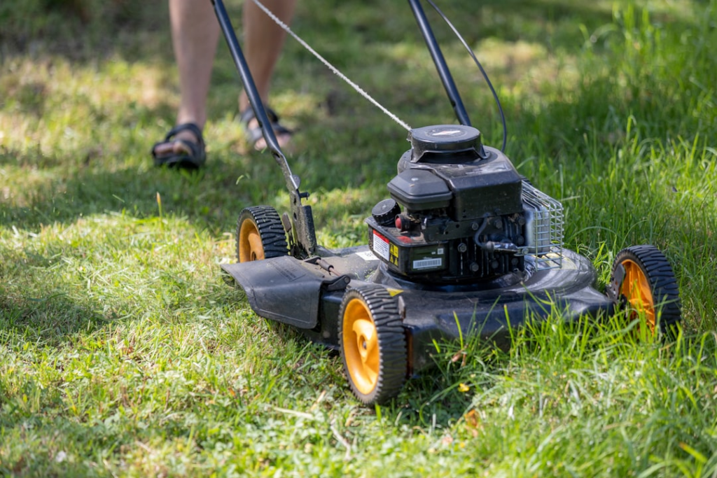Person mowing the lawnsource - https://unsplash.com/photos/a-person-mowing-the-grass-with-a-lawn-mower-YhxOrHGrQQc